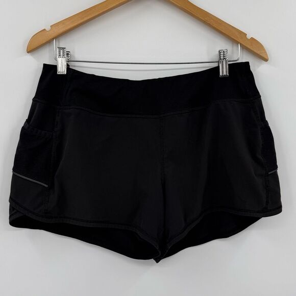 Athleta Ready Set Go Mid Rise Running Activewear Shorts in Black | Medium - Picture 2 of 8